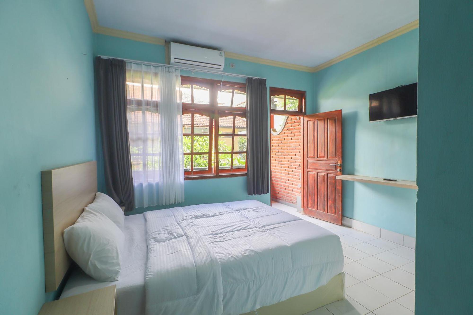 Townhouse Oak Near Formerly Sayang Maha Merta Hotel